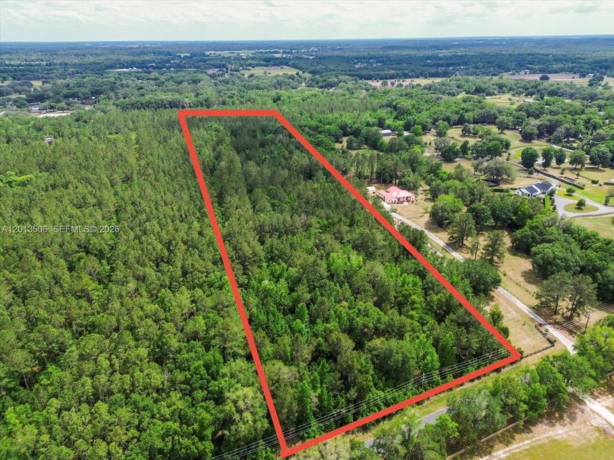 13 ACRES OF ENDLESS POSSIBILITIES IN OCALA! This expansive parcel offers endless opportunity whether you’re envisioning a private estate, equestrian compound, family retreat, agricultural use, or future development potential. With ample space to build and design freely, this property is ideal for those seeking privacy, flexibility, and long-term upside. Surrounded by Ocala’s signature rolling landscapes and natural beauty, the area is widely known as the “Horse Capital of the World,” making it especially attractive for equestrian enthusiasts. Just a short drive away, you’ll find world-class facilities like World Equestrian Center, as well as nearby parks, trails, and outdoor recreation. Convenient access to major roadways provides connectivity to shopping, dining, and everyday essentials, while still maintaining a peaceful, rural atmosphere. Whether you’re looking to build now or hold for future appreciation, this is a rare chance to secure a sizable tract in one of Central Florida’s fastest-growing areas.
