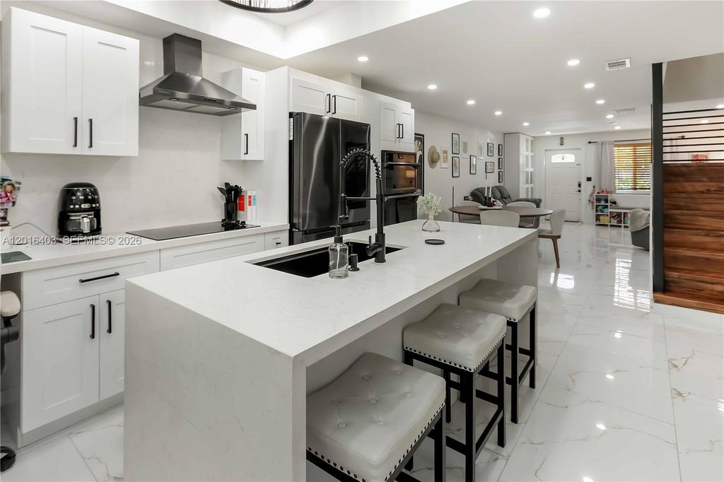 Photo of 2200 Monroe St #12, Hollywood, FL 33020 (MLS # A12016403)