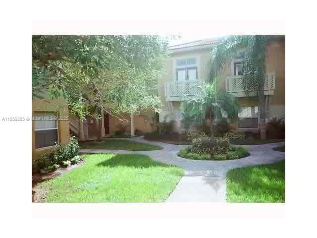 Two-bedroom, two-bath villa featuring a balcony accessible from both the bedroom and living room. In-unit washer and dryer. Water and trash services are included.