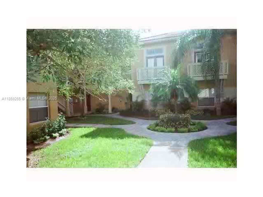 Two-bedroom, two-bath villa featuring a balcony accessible from both the bedroom and living room. In-unit washer and dryer. Water and trash services are included.