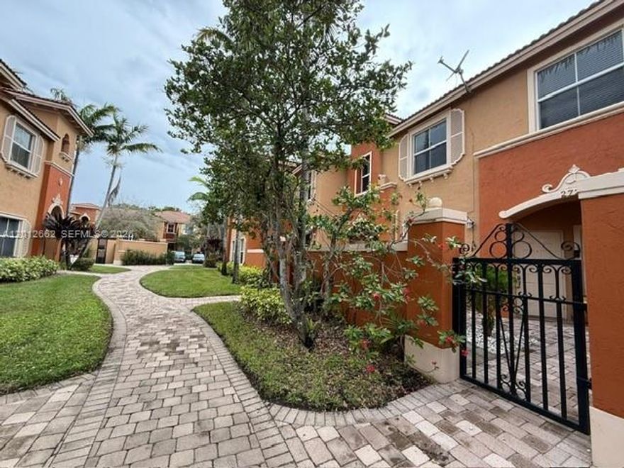 Beautiful 2/beds, 2 1/2 baths unit, tile throughout down and upstairs. Laminated wood stairs. Nice little yard in front of the unit. Stainless steel appliances and granite countertops. Very cozy, and both rooms with a private bathroom. Gated Community. Pets are allowed with a non-refundable deposit.