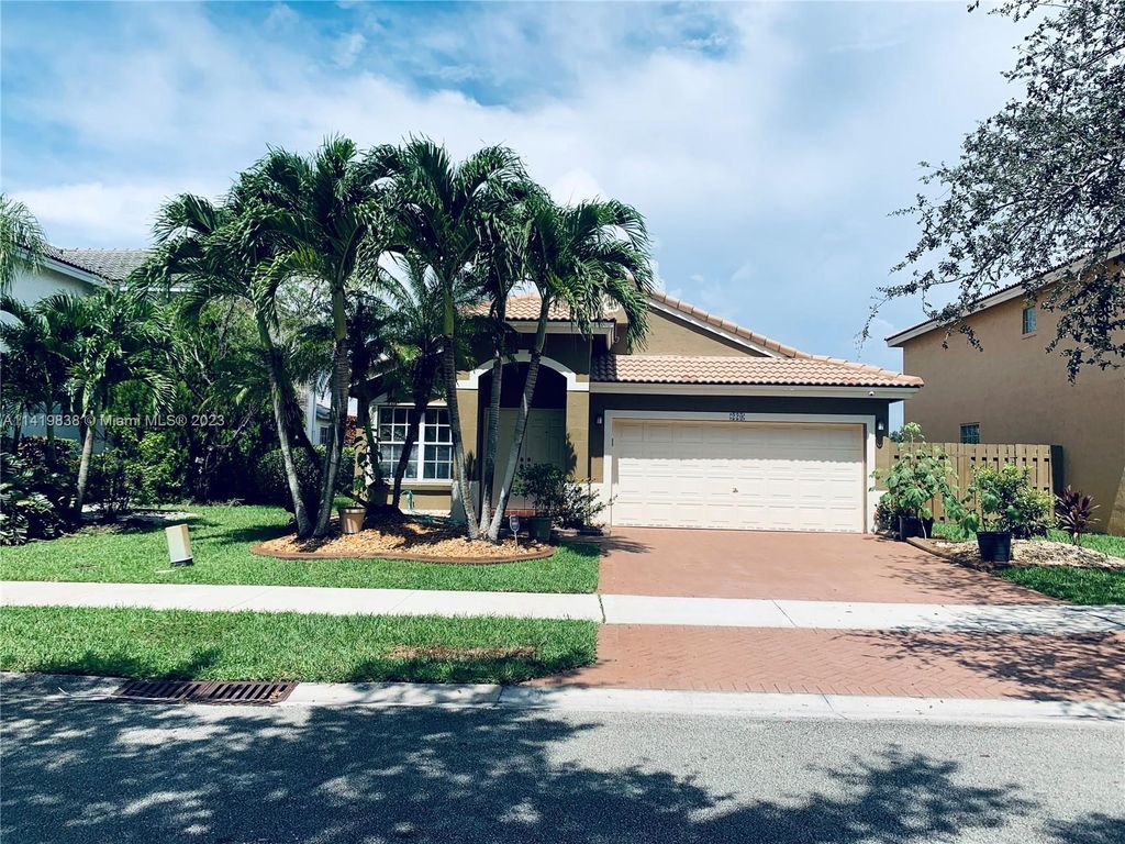Photo of 220 SW 203rd Ave, Pembroke Pines, FL 33029 (MLS # A11419838)