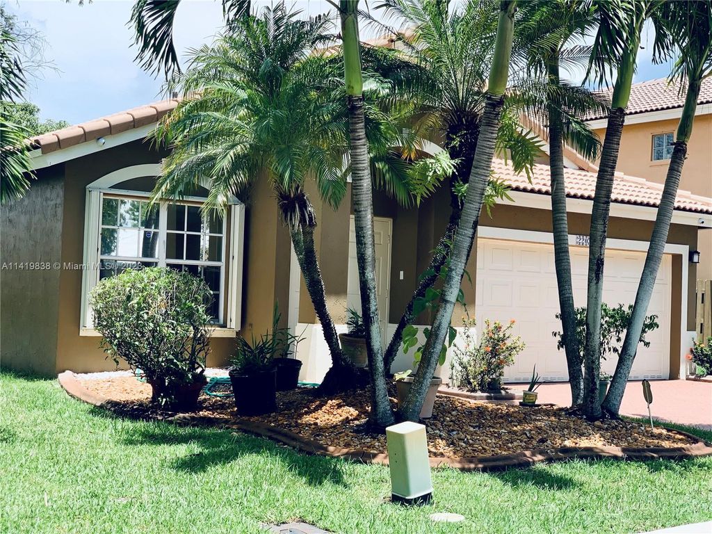 Photo of 220 SW 203rd Ave, Pembroke Pines, FL 33029 (MLS # A11419838)