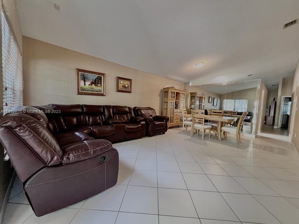 Photo of 220 SW 203rd Ave, Pembroke Pines, FL 33029 (MLS # A11419838)