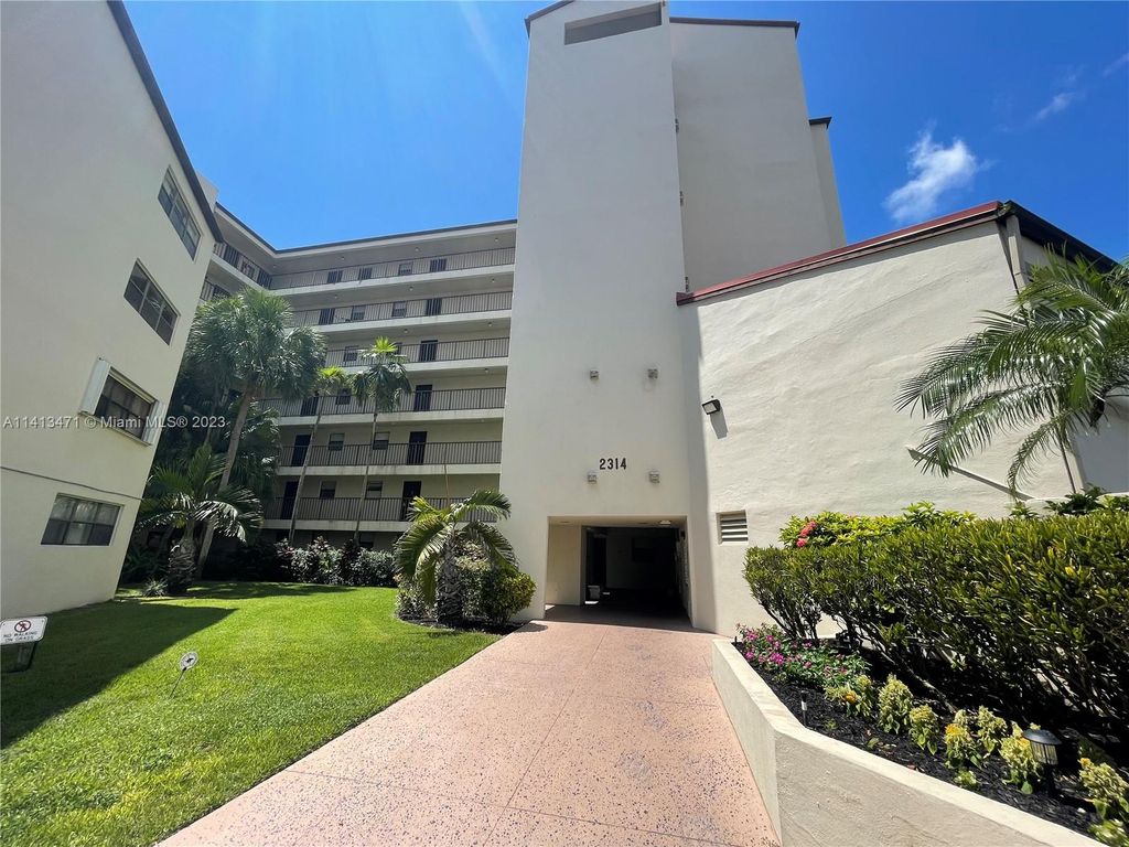 Photo of 2314 S Cypress Bend Dr #514, Pompano Beach, FL 33069 (MLS # A11413471)