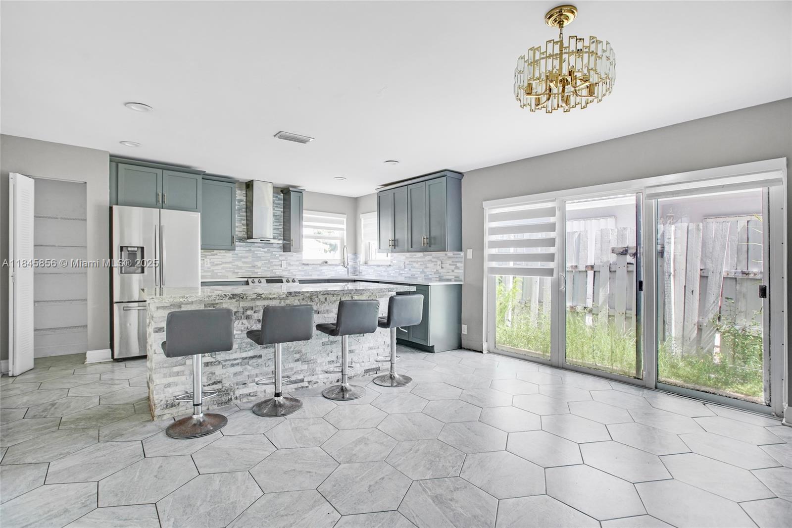 Welcome to this beautifully remodeled 3 bedroom 3 bath home nestled in the highly sought after Coral Point community in Winston Park, Coconut Creek. This move-in ready gem features an open floor plan filled with natural light, creating a warm and inviting atmosphere throughout. The heart of the home is a stunning modern kitchen complete with an island, sleek cabinetry, and beautiful stainless steel appliances. Enjoy a spacious and functional layout with three full baths, perfect for comfortable living and hosting guests. Stylish finishes and thoughtful updates make this home feel brand new. Step outside to your private patio and backyard space, ideal for relaxing or entertaining. With charm, comfort, and convenience all in one, this home is ready to welcome its next owner.