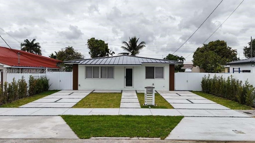 Welcome to this beautiful, recently renovated single-family home situated in the heart of Miami—a property that offers an exceptional investment opportunity or serves as the perfect home for first-time buyers. Recently renovated with impeccable taste and quality, this move-in-ready residence—awaiting its new owners—features a modern kitchen, a spacious living area, and elegant flooring. Furthermore, it boasts a brand-new roof, providing you with complete peace of mind for years to come. Enjoy comfortable living thanks to a new air conditioning system. With four bedrooms and three bathrooms, this home offers the ideal setting for hosting family and friends, highlighted by a terrace perfect for socializing alongside a charming backyard. The property is further distinguished by its new concrete driveway (constructed with all necessary permits) and a contemporary-style metal fence—features that enhance both its curb appeal and security. With a prime location just minutes from Miami International Airport and the new Soccer Stadium, as well as offering easy access to major highways, this home allows for effortless commuting to Brickell, Wynwood, Downtown Miami, the beaches, and Coral Gables—combining the convenience of urban living with the charm of a residential neighborhood. Don't let this unique opportunity slip away: acquire an extraordinary home in one of Miami's most coveted areas!