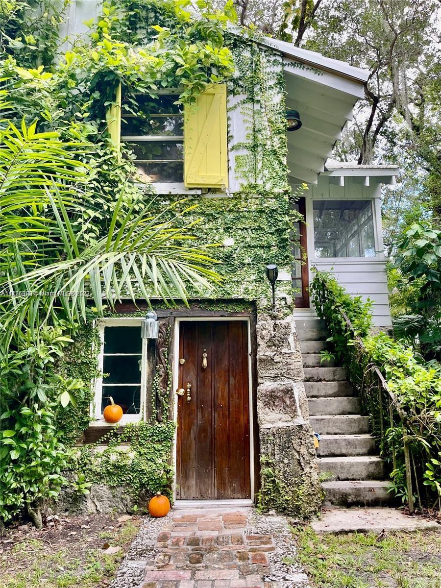 Huge guest house in multimillion dollar neighborhood, TRULY one of a kind, very charming, rustic, 2 story 1937 old Florida vernacular home. Perfect for nature lovers. Set at the end of a long driveway leading to a lush 1/2 acre wild tropical hammock. Dade County Pine floors, 2 updated baths & kitchen. Two living areas, overlooking the huge yard with ancient oaks draped with Spanish Moss, exotic orchids & bromeliads. Three bedrooms & one bath upstairs, an additional bedroom area downstairs with new bath. Very close to Matheson Hammock's beautiful beach, Fairchild Gardens, Pinecrest Gardens, South Miami business district and Fairchild Gardens. Please provide credit report, proof of income & previous landlords. Spiral staircase so not ideal for small children or anyone with mobility issues.