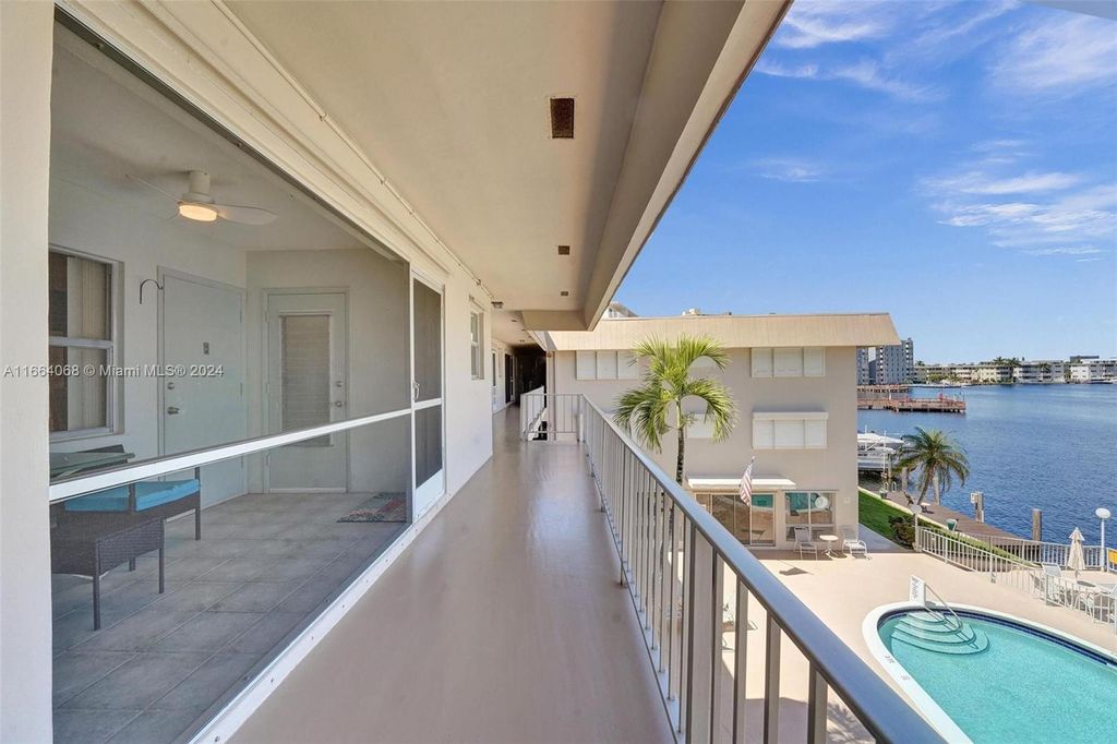 Photo of 300 Golden Isles Dr #315, Hallandale Beach, FL 33009 (MLS # A11664068)