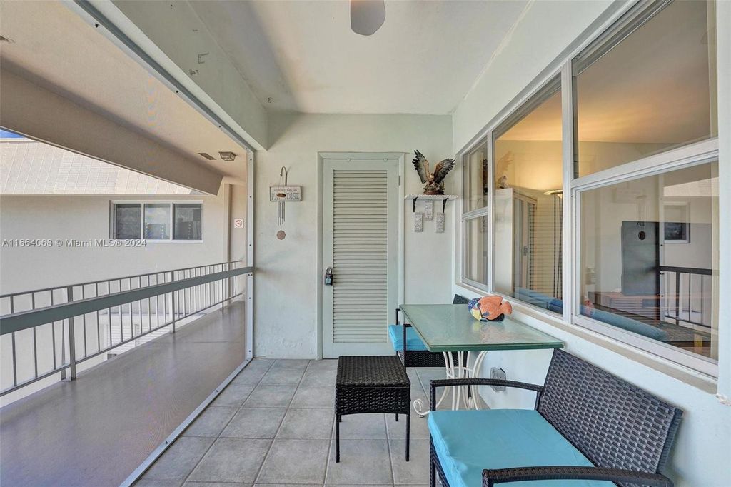 Photo of 300 Golden Isles Dr #315, Hallandale Beach, FL 33009 (MLS # A11664068)