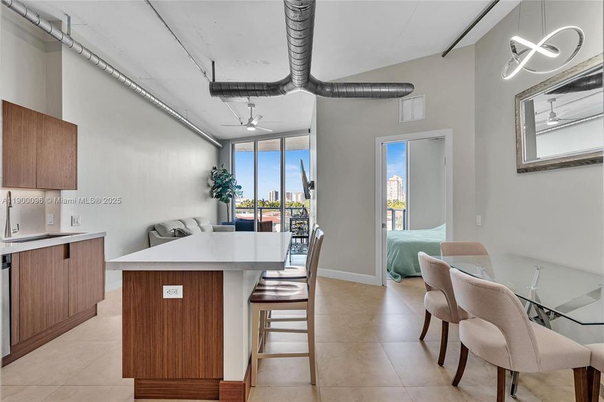 Luxury living in this beautifully upgraded residence at Up Town Marina Lofts. This stunning unit features an Italian custom kitchen with sleek cabinetry, under-cabinet lighting, beautiful countertops, and an eat-in dining area perfect for entertaining.
Custom Millwork armoire closet cabinets, electrical shades throughout, and a completely renovated master bathroom showcasing a floating double vanity, elegant tile finishes, and modern lighting.The building offers resort-style amenities including a fitness center, tennis and basketball courts, sauna, steam room, yoga and massage rooms, pool, and jacuzzi.
Located just steps from parks, top-rated schools, golf courses, shopping, and dining, this residence combines modern design, resort comfort and breathtaking water views.