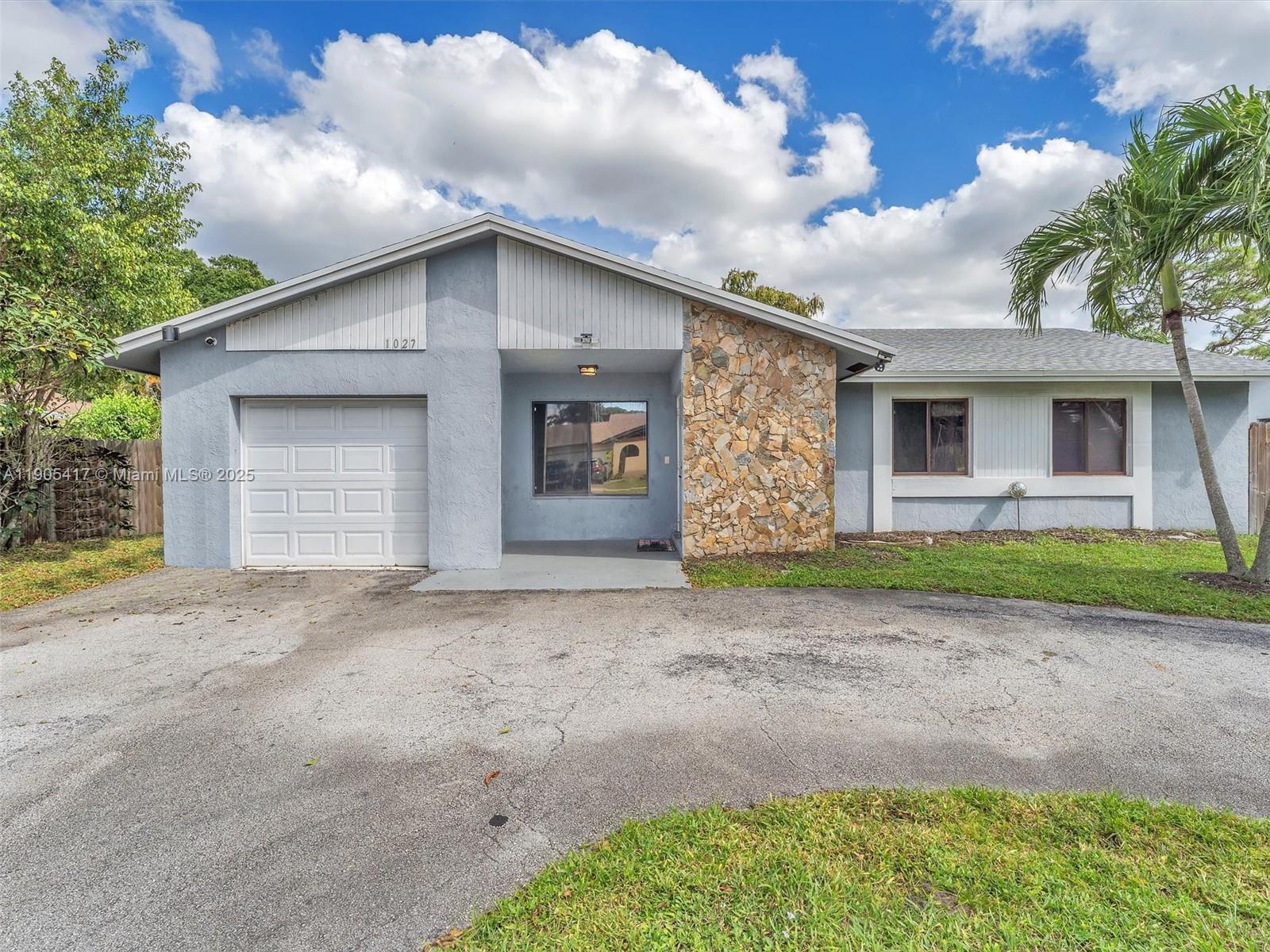 Welcome to your Home Sweet Home in Margate, Florida! This beautiful 3 bedroom, 2 bath home with a 1 car garage has no rear neighbors for extra privacy. Enjoy a circular driveway with plenty of parking for family and guests. Inside features tile floors throughout, a spacious living and dining combo, and an enclosed Florida room perfect for an office, playroom, or lounge. Step outside to a large backyard with room for a pool or garden and mature fruit trees including orange, lemon, lime, and mango. The roof was replaced in 2022, giving you peace of mind for years to come. Located in the heart of Margate near shopping, dining, parks, and major highways, plus just minutes from Coconut Creek, Coral Springs, and the beaches. Don’t wait. Schedule your private tour today and make this your home.