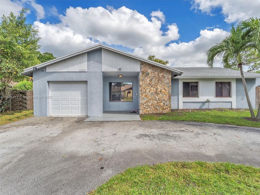 Welcome to your Home Sweet Home in Margate, Florida! This beautiful 3 bedroom, 2 bath home with a 1 car garage has no rear neighbors for extra privacy. Enjoy a circular driveway with plenty of parking for family and guests. Inside features tile floors throughout, a spacious living and dining combo, and an enclosed Florida room perfect for an office, playroom, or lounge. Step outside to a large backyard with room for a pool or garden and mature fruit trees including orange, lemon, lime, and mango. The roof was replaced in 2022, giving you peace of mind for years to come. Located in the heart of Margate near shopping, dining, parks, and major highways, plus just minutes from Coconut Creek, Coral Springs, and the beaches. Don’t wait. Schedule your private tour today and make this your home.