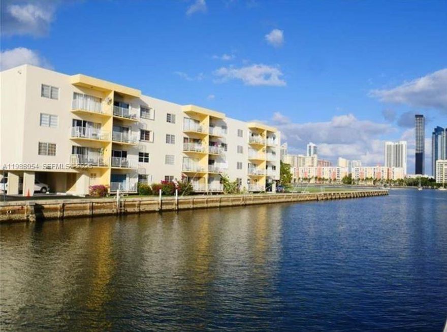 Waterfront Unit 2/2 – Move-In Ready in Desirable Eastern Shores!
Enjoy beautiful Intracoastal Waterway views from your private open balcony. This spacious unit offers a comfortable living area, walk-in closets, and a primary bathroom with a Roman tub. The kitchen provides ample storage and functionality, with plenty of space throughout the home.
Includes 1 deeded parking space (#30). Located in a walkable neighborhood just a short distance to the beach and Oleta River State Park, and within easy reach of shopping, dining, and a nearby movie theater. 
Great opportunity to make it your own—don’t miss it! Please see broker remarks!