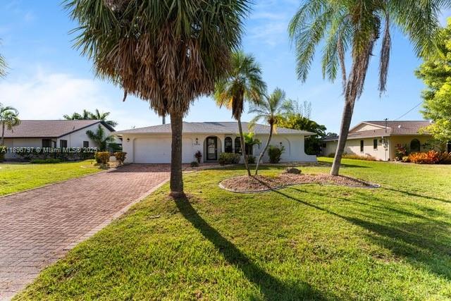 Experience elevated waterfront living in this updated 3 bed / 2 bath pool home with 2-car garage on a 10,000 sq/ft lot. Enjoy a private dock with boat lift, formal living room, family room, and quartz kitchen with bar seating. The primary suite offers a private office with serene water views. Located in one of Cape Coral’s premier boating communities, just minutes from parks, dining, and Gulf access. Embrace the Florida lifestyle with year-round sun, natural beauty, and endless recreation.
**This property is being sold as-is, property is lender-owned and US Bank is making no representations or warranties**
***Multiple Offers Received - Highest and Best deadline is Monday at 8am EST***