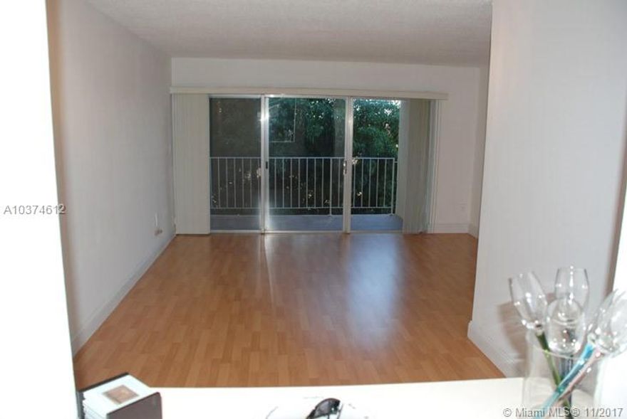 Large and excellent unit. Laminated wood floor throughout.Stainless steel appliances. Washer and dryer inside.Private balconies.Gated community w/ security guard.Plenty of amenities. 1 assigned parking plus guest spots.Close to the Palmetto, malls and airport. Brand new central A/C