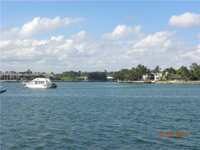 UNIQUE OPPORTUNITY TO OWN THIS SUPERB HOME PERCHED AT THE EDGE OF BISCAYNE BAY. OPEN OCEAN ACCESS/PRIVATE DOCK THAT ALLOWS YOU TO ARRIVE BY CAR OR BOAT. TASTEFULLY RENOVATED THIS MIAMI MID CENTURY JEWEL HAS MUCH TO OFFER. 24 HRS SURVEILLANCE GATED COMMUNITY. NO HOA. IT PROVIDES A TERRACE OVERLOOKING POOL & BAY. 50 FEET WATER ACCESS.SPANISH STONE POOL DECK & CONCRETE DOCK/LIFT FOR BOATS & JET SKIS. BARREL ROOF. MARBLE FLOORING THROUGHOUT INCLUDING BATHROOMS. 2022 BRAND NEW KITCHEN. SS APPLIANCES. BACKLIGHT CRISTALO COUNTERTOPS/BACKSPLASH. FULLY EQUIPPED OUTDOOR KITCHEN. 15 MINUTES WALK TO NORTH BEACH OCEANSIDE PARK. CALL/TEXT LISTING AGENT FOR SHOWINGS. OWNER MOTIVATED