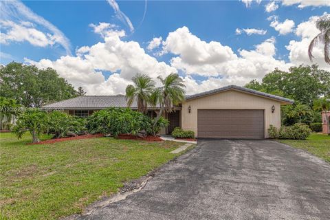 Photo of 10930 NW 41st Dr, Coral Springs, FL 33065 (MLS # A12002238)