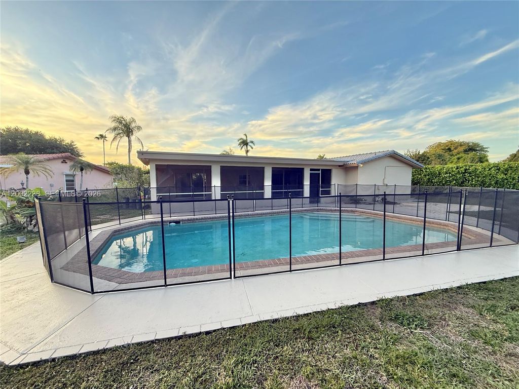 Photo of 10930 NW 41st Dr, Coral Springs, FL 33065 (MLS # A12002238)