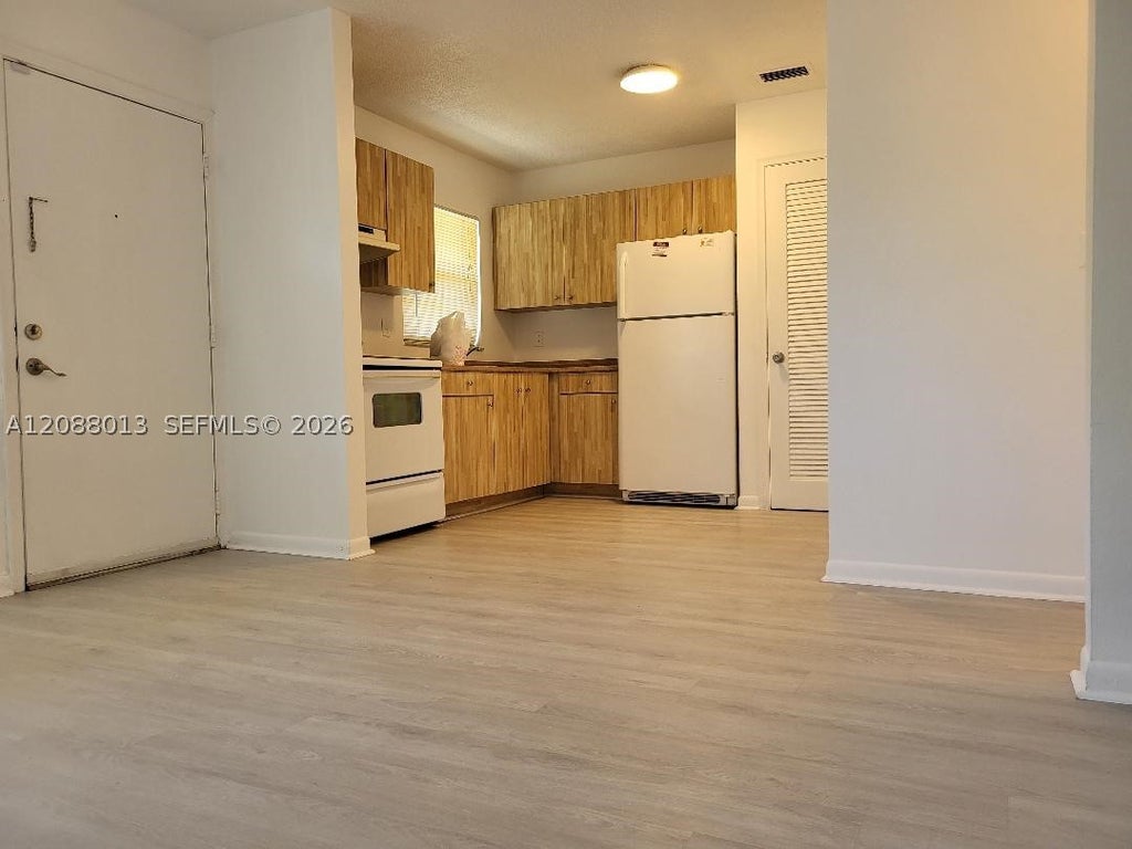 Photo of 5156 NE 6th Ave #219, Oakland Park, FL 33334 (MLS # A12088013)
