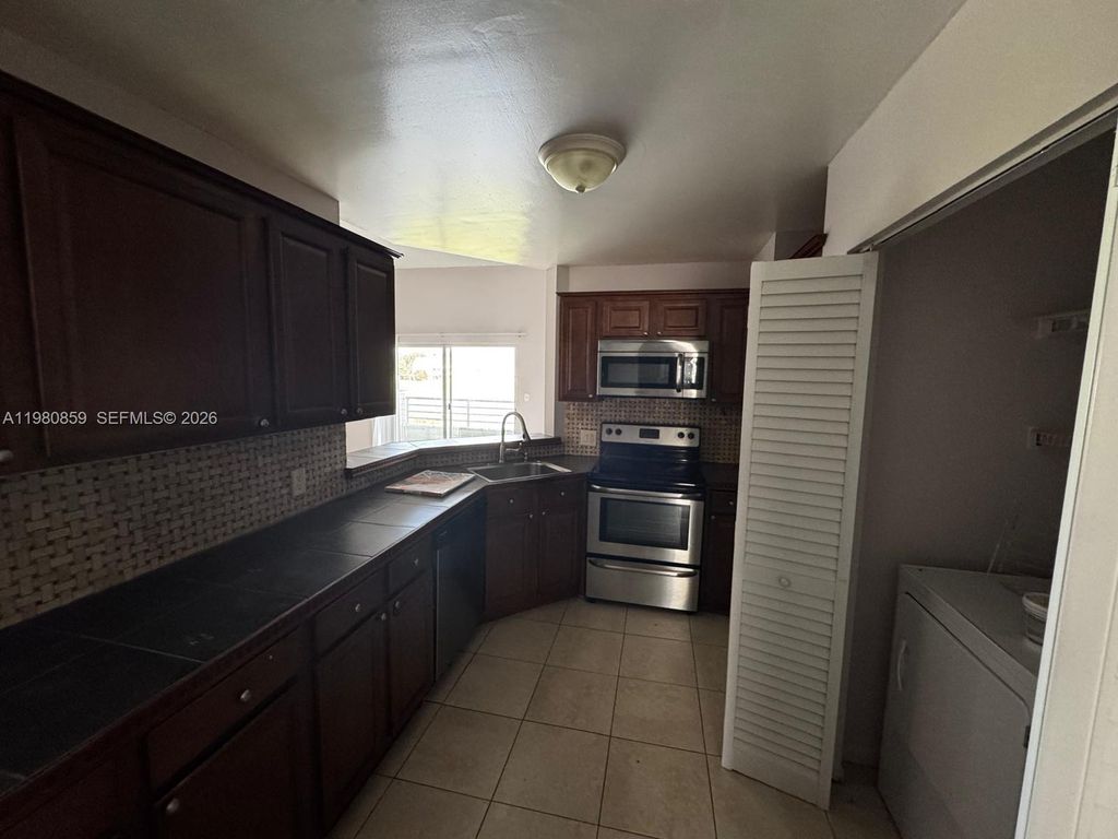 Photo of 3441 NW 44th St #106, Oakland Park, FL 33309 (MLS # A11980859)