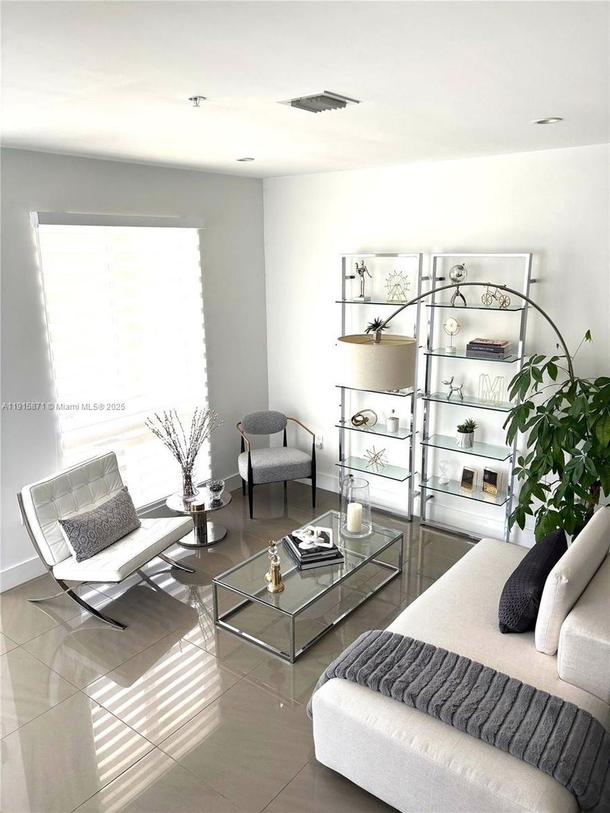 Beautiful and bright 3-story corner townhome in Landmark at Doral featuring 3 bedrooms, 2.5 baths, and a family room. Designed for comfortable living with high ceilings, ceramic tile floors on the first floor, and carpeted bedrooms upstairs. The spacious primary suite includes remote-controlled shades. Enjoy a modern kitchen with quartz countertops, touchless faucet, and stainless steel appliances. 1-car garage, great location near schools, parks, shopping, and Turnpike.