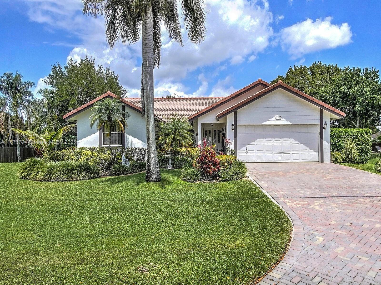 This beautiful 4 bedrooms and 2 bathrooms single-home features a bright eat-in kitchen with oak cabinets, spacious counter space, vaulted ceilings, a security system, and a recently remodeled bathroom. Perfect for families with children and pets, for entertainment and serene relaxation in a domed screened pool, surrounded by a beautiful landscape oasis. All living areas have access to the pool and deck. Covered patio area for barbequing with cool deck surface. Two-car garage, spacious living areas, and dining room. The perfect home for holiday gatherings or simply enjoying the Florida lifestyle in a great community. NO HOA