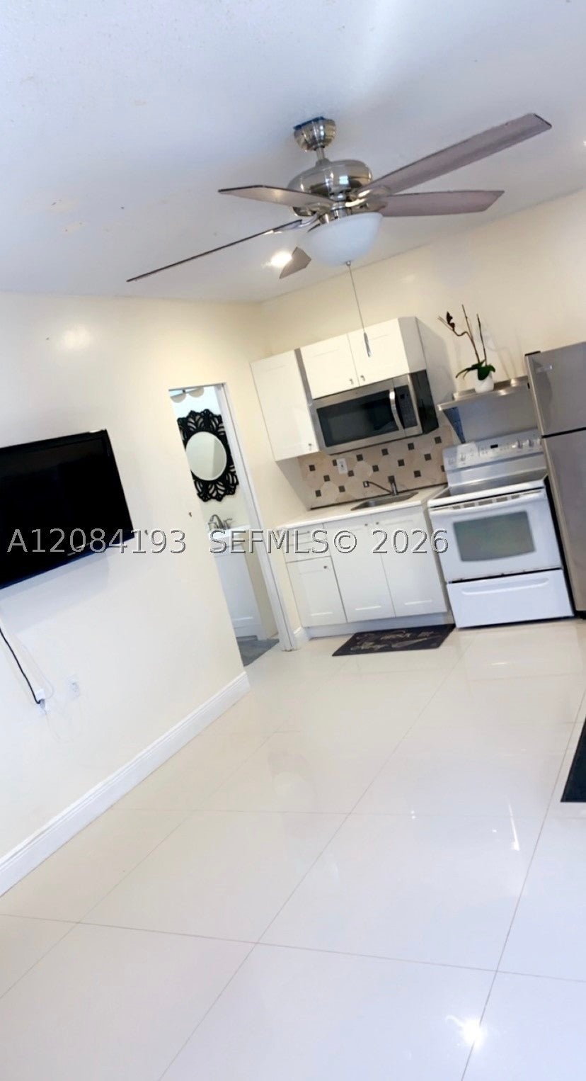 Photo of 10261 NW 24th Ct #1, Sunrise, FL 33322 (MLS # A12084193)