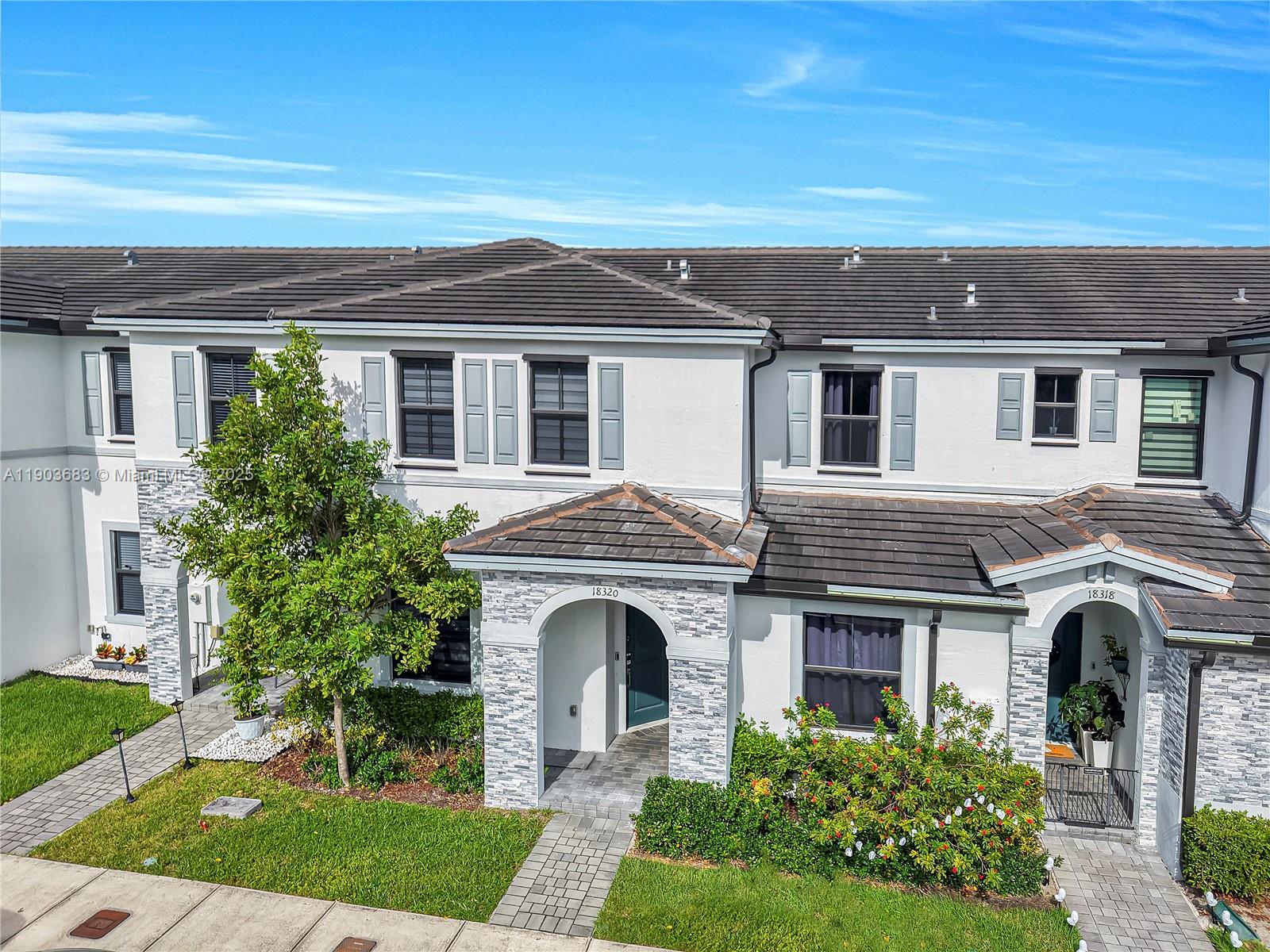 Step into this stunning, newly remodeled 3/2.5 townhome in West Kendall. Featuring sleek stainless steel kitchen appliances, hurricane shutters, laminate wood flooring, & tile flooring downstairs. The upgraded backyard is made for entertaining - perfect for gatherings & relaxing evenings. Enjoy resort - style community amenities including a pool, playground, & plenty of visitor parking. Two assigned parking spots in front of the unit.  Move-in ready with beautiful finishes & tons of natural light throughout - this home checks all the boxes!