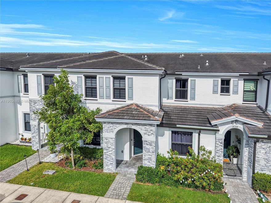 Step into this stunning, newly remodeled 3/2.5 townhome in West Kendall. Featuring sleek stainless steel kitchen appliances, hurricane shutters, laminate wood flooring, & tile flooring downstairs. The upgraded backyard is made for entertaining - perfect for gatherings & relaxing evenings. Enjoy resort - style community amenities including a pool, playground, & plenty of visitor parking. Two assigned parking spots in front of the unit.  Move-in ready with beautiful finishes & tons of natural light throughout - this home checks all the boxes!