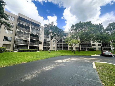 Photo of 1100 Colony Point Cir #215, Pembroke Pines, FL 33026 (MLS # A11869179)