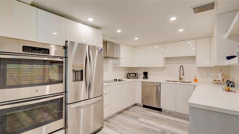 Photo of 16325 Golf Club Rd #101, Weston, FL 33326 (MLS # A12063951)