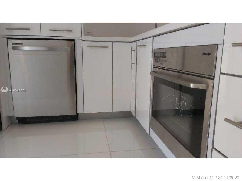 ENSENADA CONDO BLDG E-1 - Residential Lease