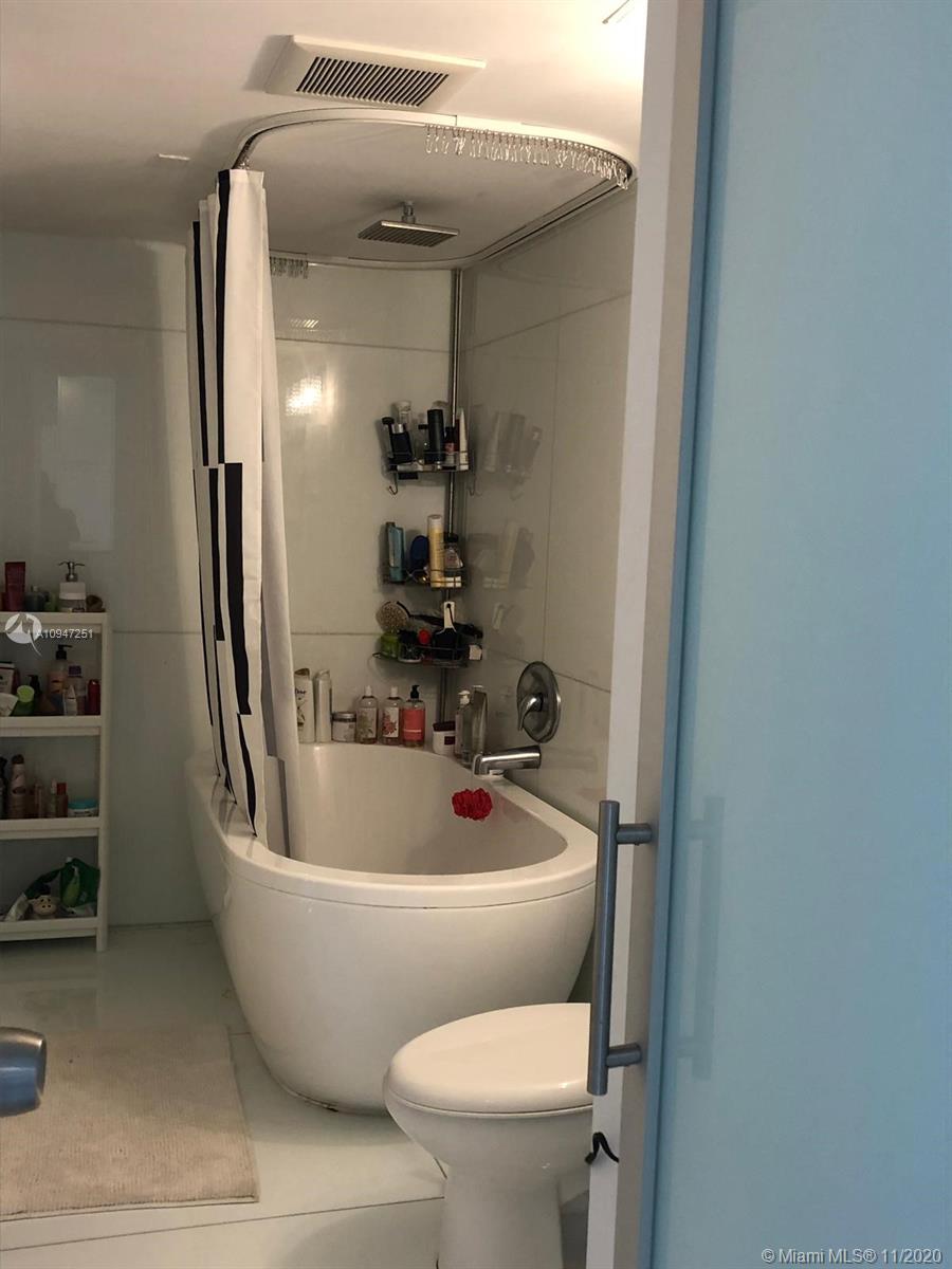 ENSENADA CONDO BLDG E-1 - Residential Lease