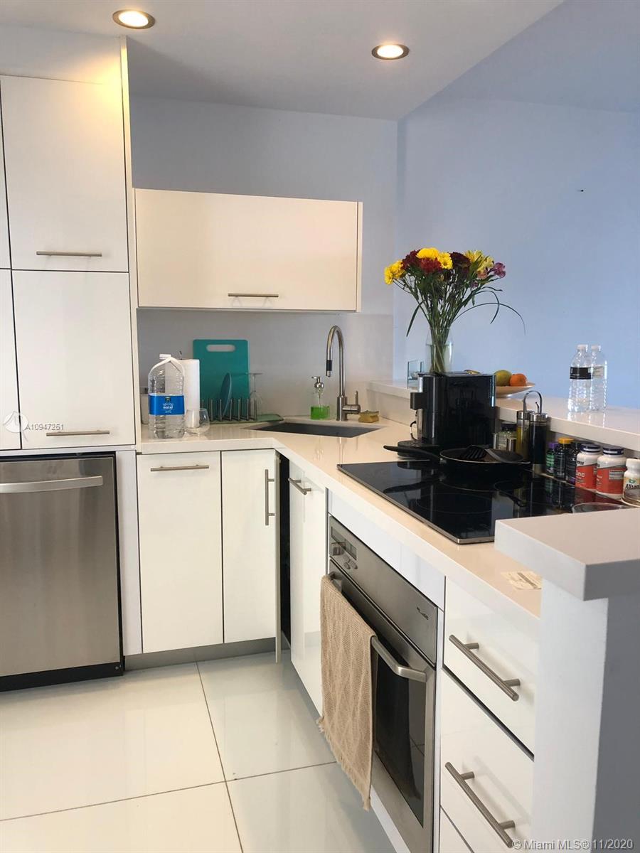 ENSENADA CONDO BLDG E-1 - Residential Lease