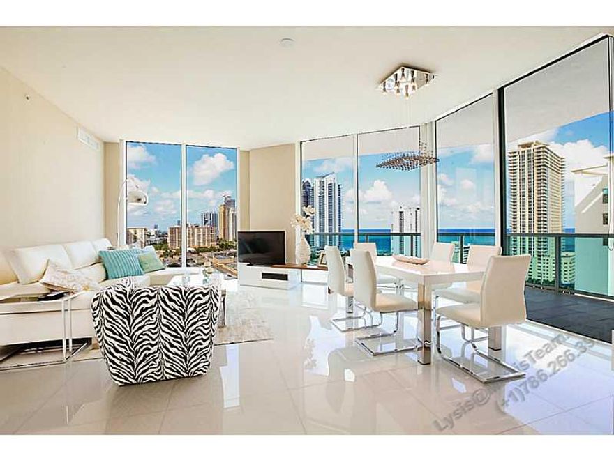 Take the perfect vacation at this designer decorated  turn-key 3br/2ba unit with amazing ocean views. Cross Collins and you are in Sunny Isles Beach. Amenities include: concierge, gym, spa, sauna, and massage room. Short term /seasonal rental for a minimu m of 3 mo. Unit is rented 12/1/14- 8/2/15  &  2/1/16-7/31/16