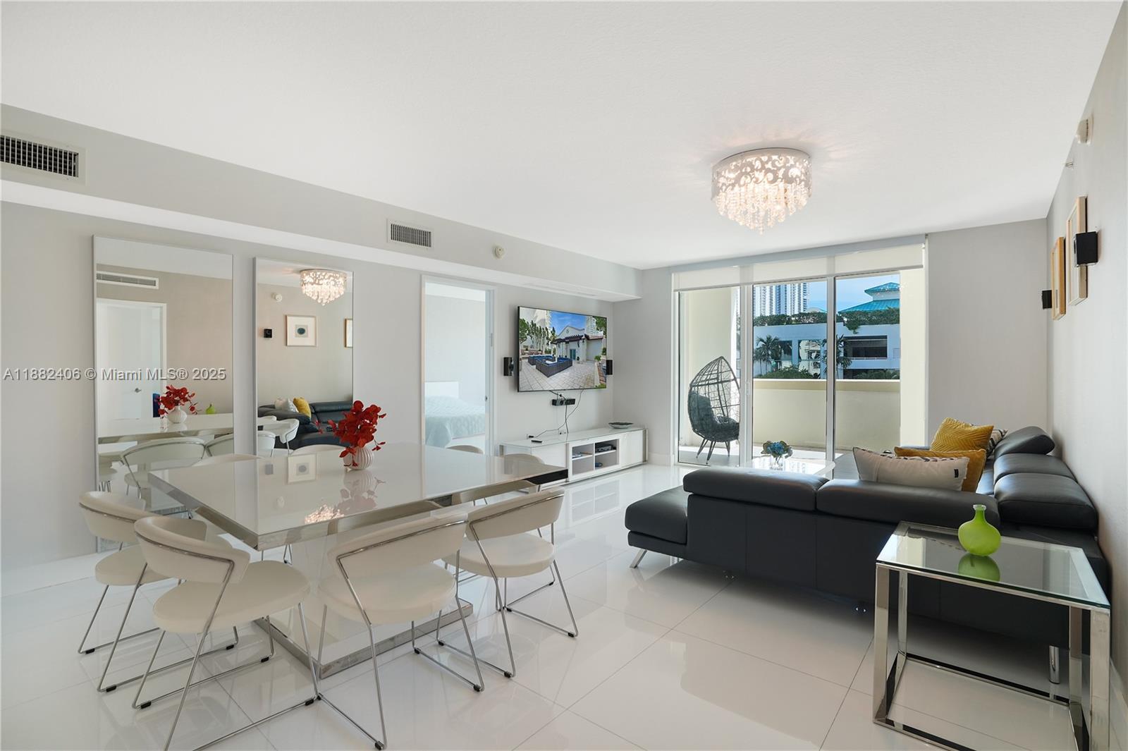 Be treated by water views from every corner of this bright and spacious residence. The interior features open floor layout and expansive floor-to-ceiling windows that bring in an abundance of natural light. The kitchen boasts imported countertop, sleek glass back splash, top-tier stainless steel appliances, and glass cook top. You`ll be just steps away from the ocean`s white sandy shores, minutes to Bal Harbor Shops and Aventura Mall. St Tropez Condo offers a host of world-class amenities, including a bay-front pool and sun deck adorned with daybeds and lounge chairs to bask in Florida sun. An outdoor entertainment and barbecue areas cater to those who relish the outdoors. The state-of-the-art wellness center boasts cutting-edge workout equipment, complemented by spa and sauna rooms.