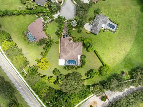 Photo of 11174 SW 37th Mnr, Davie, FL 33328 (MLS # A11871318)