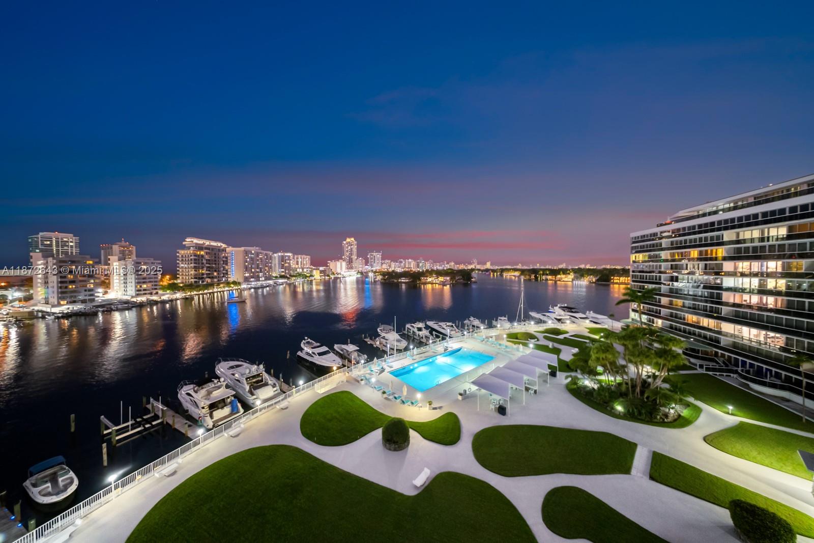 Experience timeless elegance at the iconic King Cole Condominium on Miami Beach’s Intracoastal. This spacious corner residence offers sweeping bay and city views through floor-to-ceiling windows, filling the home with natural light. The open layout blends comfort and sophistication, ideal for entertaining or everyday living. Residents enjoy resort-style amenities including a heated pool, fitness center, valet service, and a marina with dockage for yachts up to 75 feet, all within a historic MiMo-era building celebrated for its architecture. Perfectly located on Normandy Isle, just minutes from Bal Harbour, South Beach, dining, and shopping. An exceptional lifestyle at one of Miami’s most distinguished addresses.
