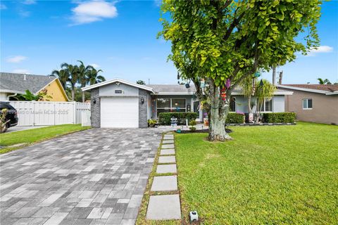 Photo of 11741 NW 43rd Pl, Sunrise, FL 33323 (MLS # A11895440)