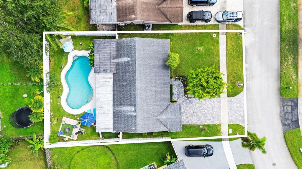 Photo of 11741 NW 43rd Pl, Sunrise, FL 33323 (MLS # A11895440)