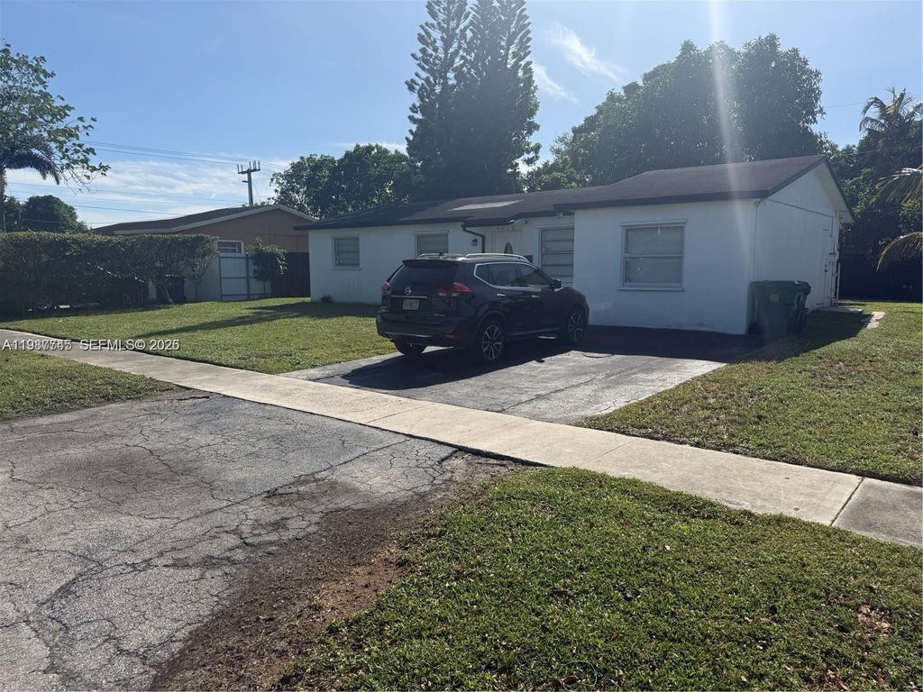 Photo of 4910 NW 18th St, Lauderhill, FL 33313 (MLS # A11987745)