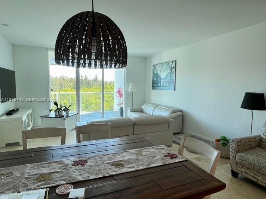 ONE FIFTY ONE – Best Value in the Building! Don’t miss this exceptional opportunity—one of the best deals in the condominium and priced to sell quickly. This spacious 2-bedroom, 2.5-bath residence is ideally located near Oleta River, Aventura, Sunny Isles, and Bal Harbour, placing you in the heart of a rapidly growing area. Enjoy a full suite of amenities, including fiber-optic internet and cable included in the HOA, one assigned garage space (additional parking available for $65/month), a resort-style pool, state-of-the-art fitness center, clubroom with pool table and ping pong, playground, and 24-hour security. An excellent investment opportunity in a booming location. Easy to show—this is a must-see!