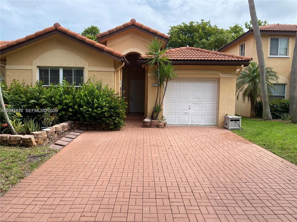 Photo of 14117 N Forest Oak Cir, Davie, FL 33325 (MLS # A11985877)