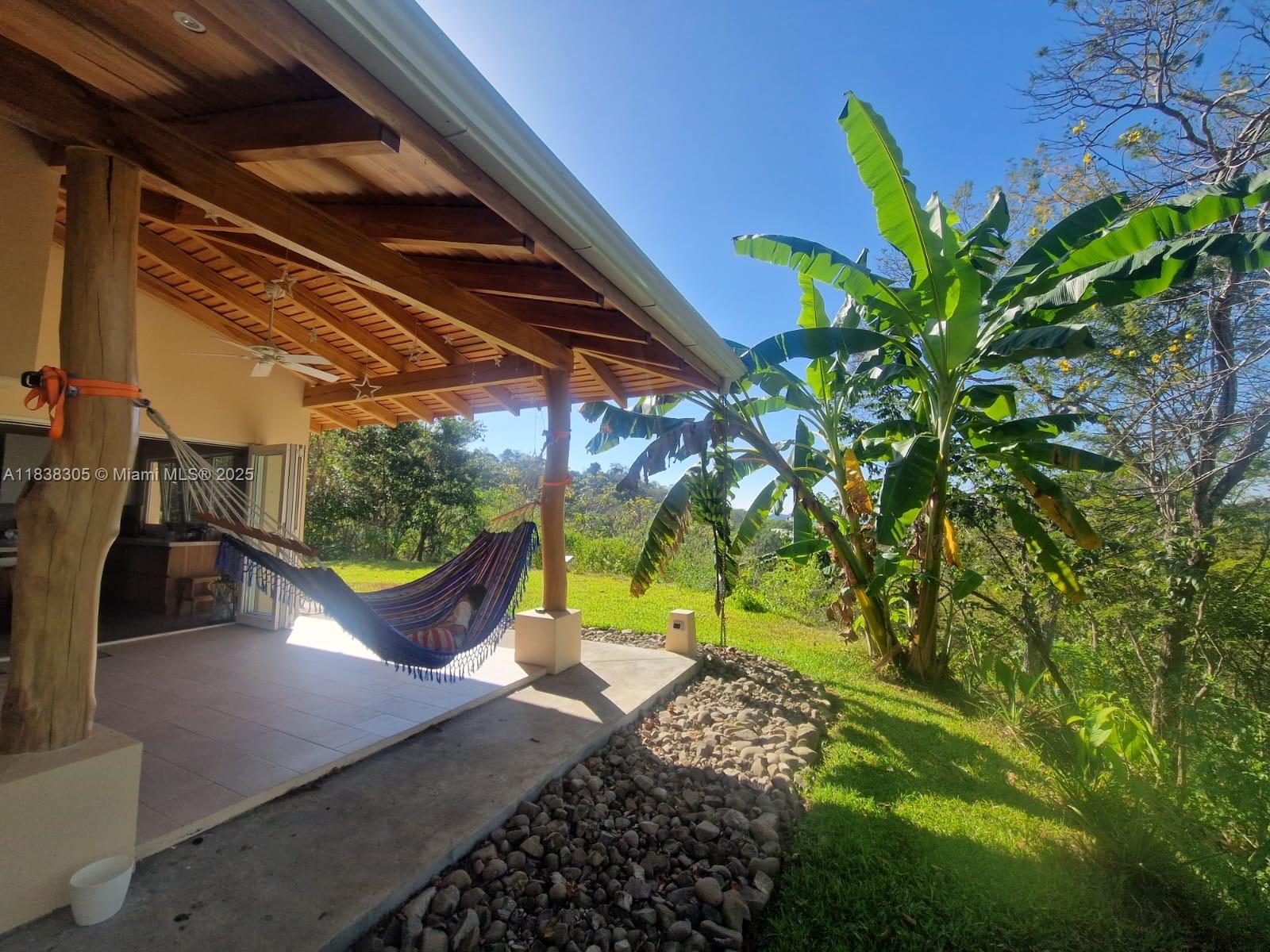 EXCLUSIVE VILLA WITH OCEAN VIEW Built in 2024, this exceptional property offers a ready-made package including a private residence with a well-planned infrastructure. Everything is already in place, allowing you to begin your new life seamlessly.In addition to this property, the owners are also offering the neighboring lot for sale. It features a yoga center, four guest bungalows, a spacious hall, and a well-designed infrastructure. Both properties can be purchased either together or separately.