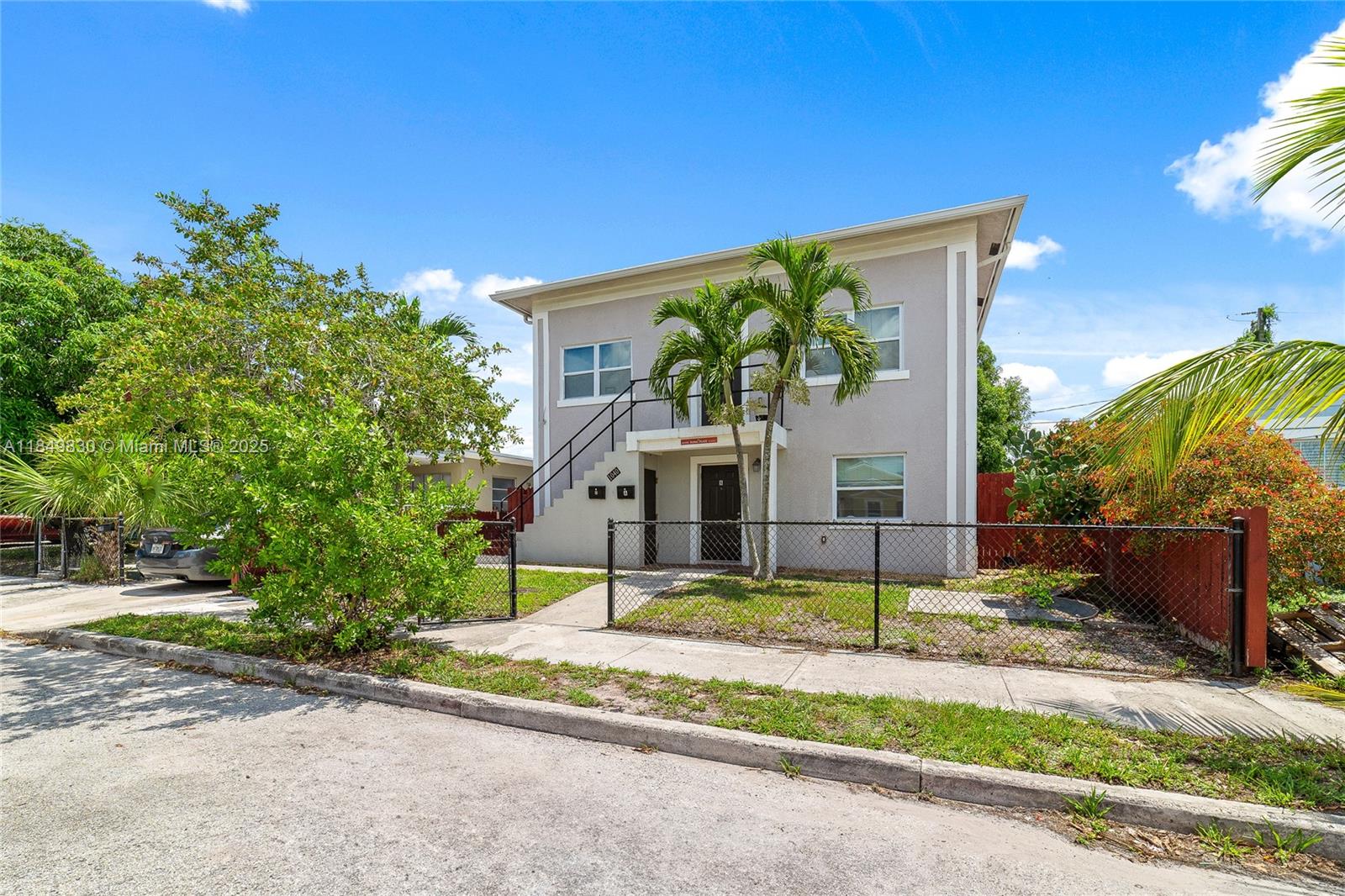 Charming 1926 duplex located near the NORA redevelopment district, offering two spacious 3-bedroom, 2-bath units with mirrored layouts. Upstairs Unit A features high ceilings, wood-look tile flooring, and a private rear staircase to the backyard. Downstairs Unit B is fully tiled and opens to a large, fenced yard with a mature mango tree. Both units are equipped with updated plumbing, tankless water heaters, new electric, LED lighting, and impact windows. Roof replaced in 2017. Separate electric meters, off-street parking, and a dedicated storage closet for enhance convenience. Strong rental history and desirable location make this an excellent opportunity for long-term investment or personal use. **Mortgage Savings may be available for buyers of this listing.