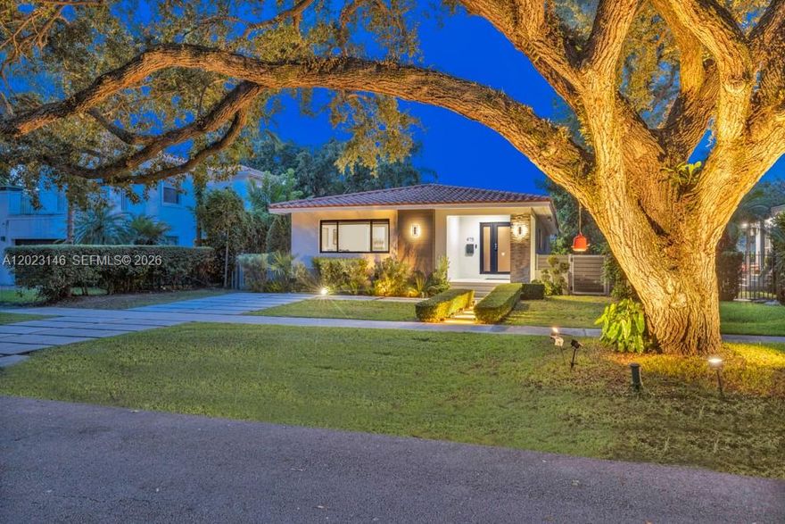 Sophisticatedly renovated 3-bedroom, 2-bath residence nestled on a quiet tree-lined street in the heart of Miami Shores. Offering nearly 2,000 SF of bright open living space, this home blends timeless charm with modern elegance. Features include spacious formal living and dining areas, a designer kitchen with oversized island, premium cabinetry, Bosch appliances, and quartz countertops. The primary suite boasts generous closet space and a spa-inspired bath with elegant Italian porcelain finishes. Enjoy a private fenced backyard with pergola, lush landscaping, and plenty of room for a pool—perfect for entertaining or relaxing. Ideally located just moments from Downtown Miami Shores, top dining, parks, schools, and a short drive to the Design District, Wynwood, and Miami Beach.