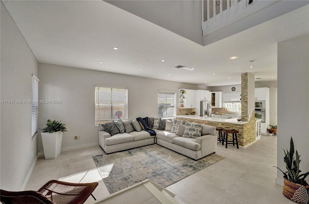 Photo of 10120 NW 6th St, Pembroke Pines, FL 33026 (MLS # A11547308)