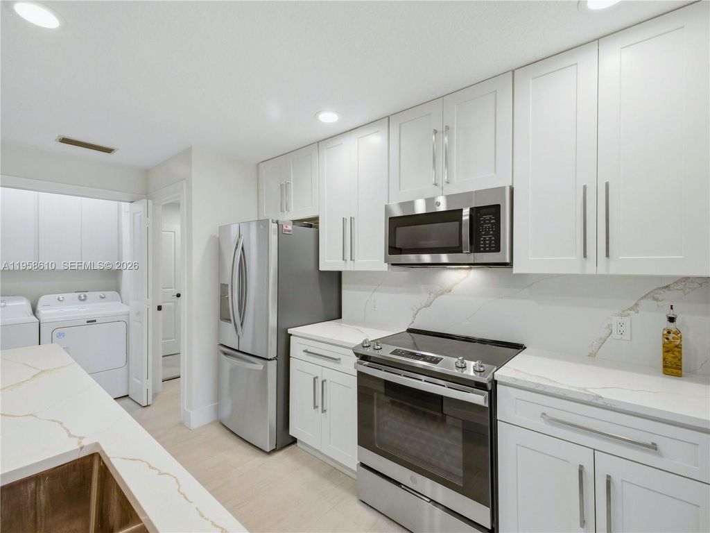 Photo of 803 Silverleaf Oak Ct, Palm Beach Gardens, FL 33410 (MLS # A11958610)