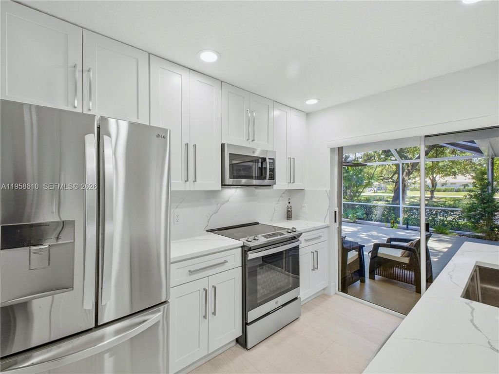 Photo of 803 Silverleaf Oak Ct, Palm Beach Gardens, FL 33410 (MLS # A11958610)